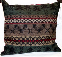  Wool  fabric front pillow with snow shoes and backed with dark red cotton. Filled with polyester. Made by Linda Monasky <br />